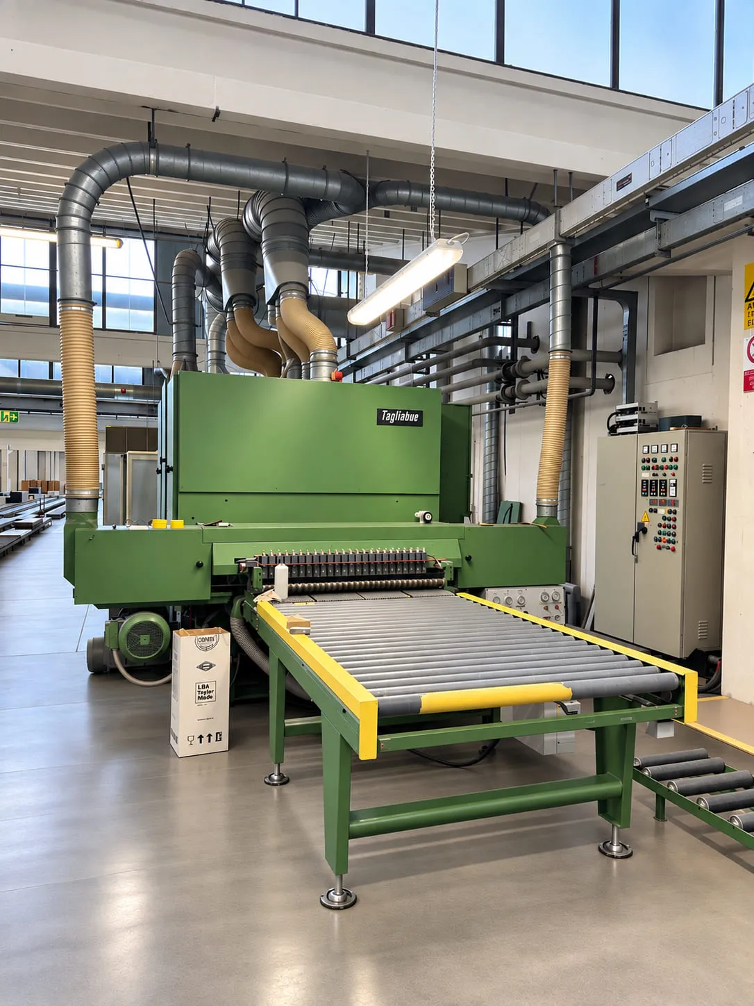 A Tagliabue sanding machine built decades ago, still in production in a woodworking plant
